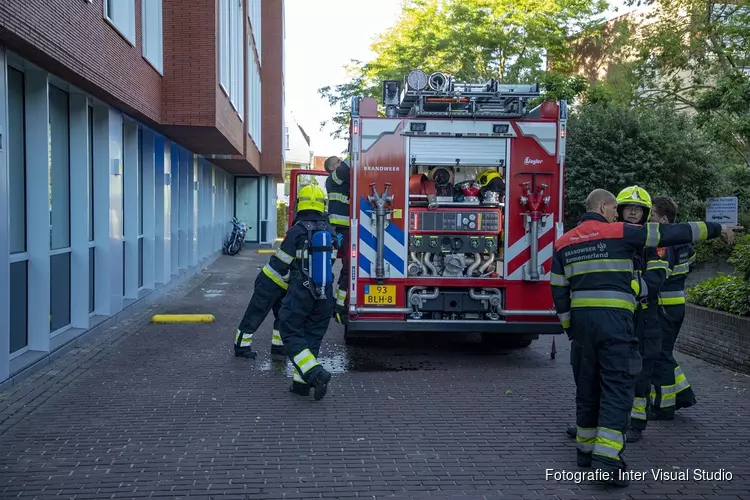 Trappenhuis parkeergarage vol met rook na brand