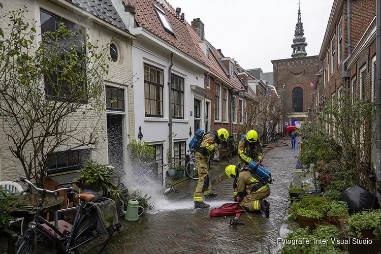 Schoorsteenbrand bij woning in Kerkstraat in Haarlem